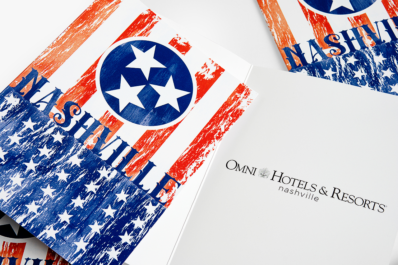 A custom printed invitation with a flag design and 