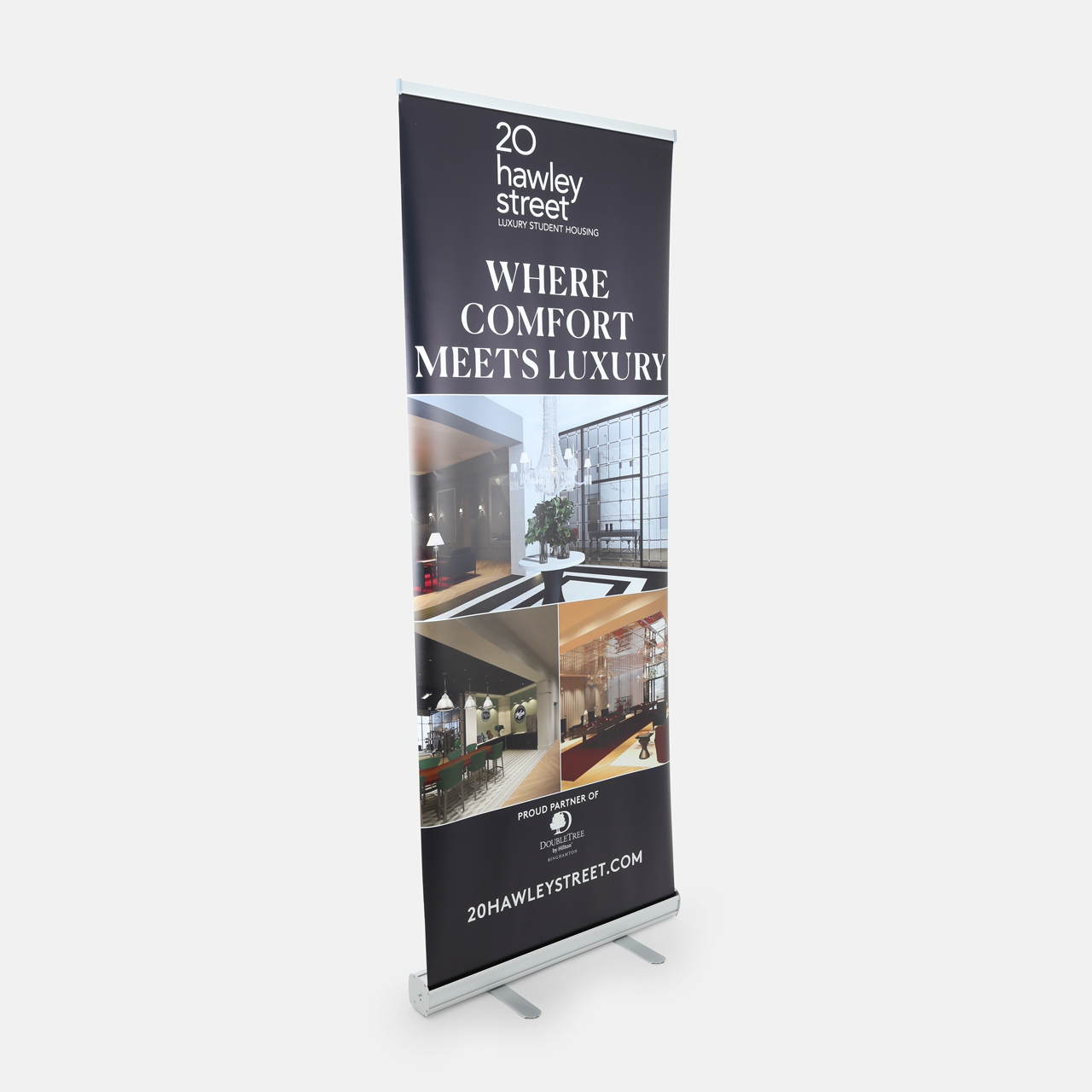A custom retractable banner with a silver stand printed with real estate imagery and 