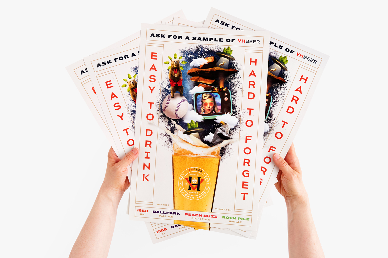 Two hands holding custom posters designed with Oktoberfest marketing imagery and information.