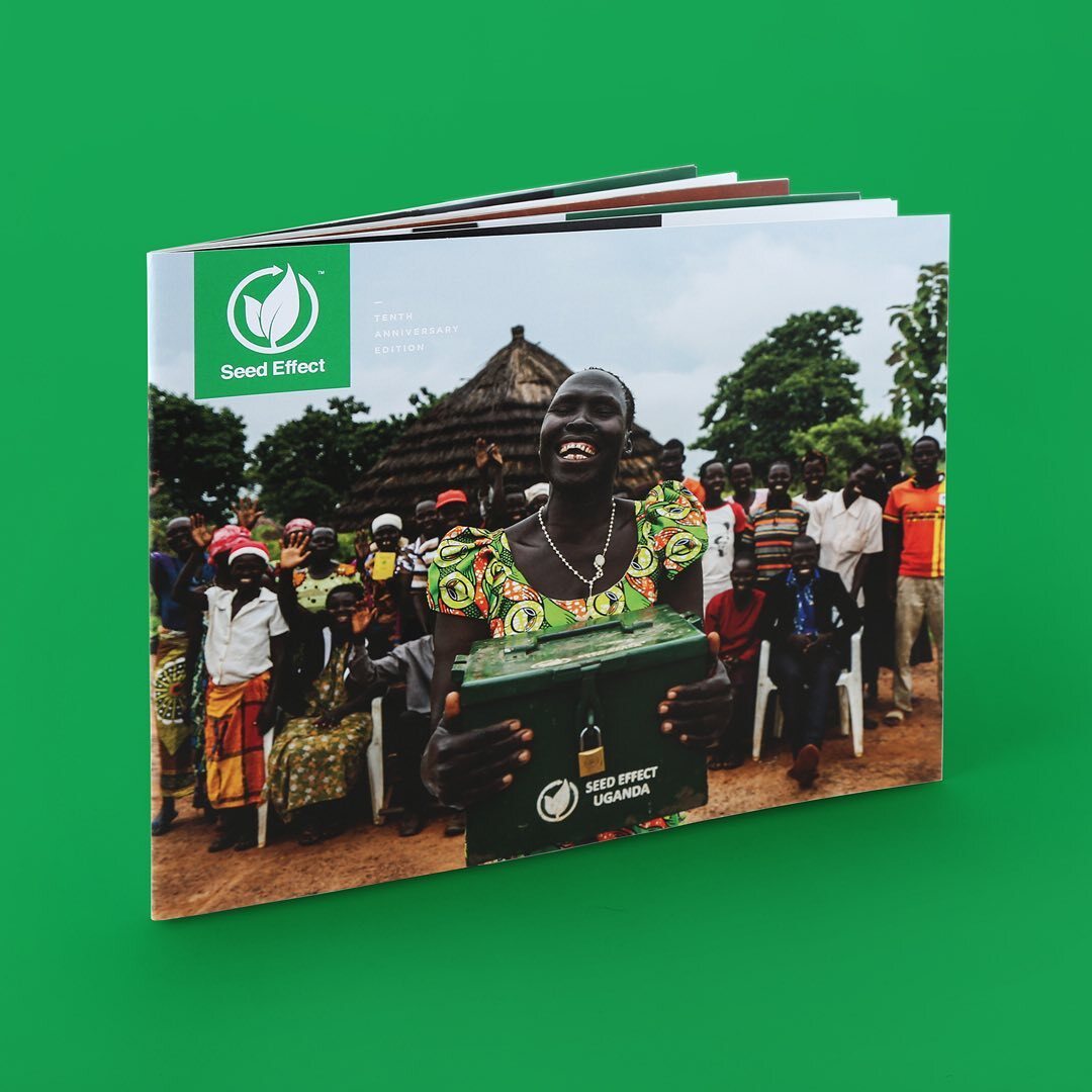 A Seed Effect annual report booklet with a green design and a group of smiling people on the cover.