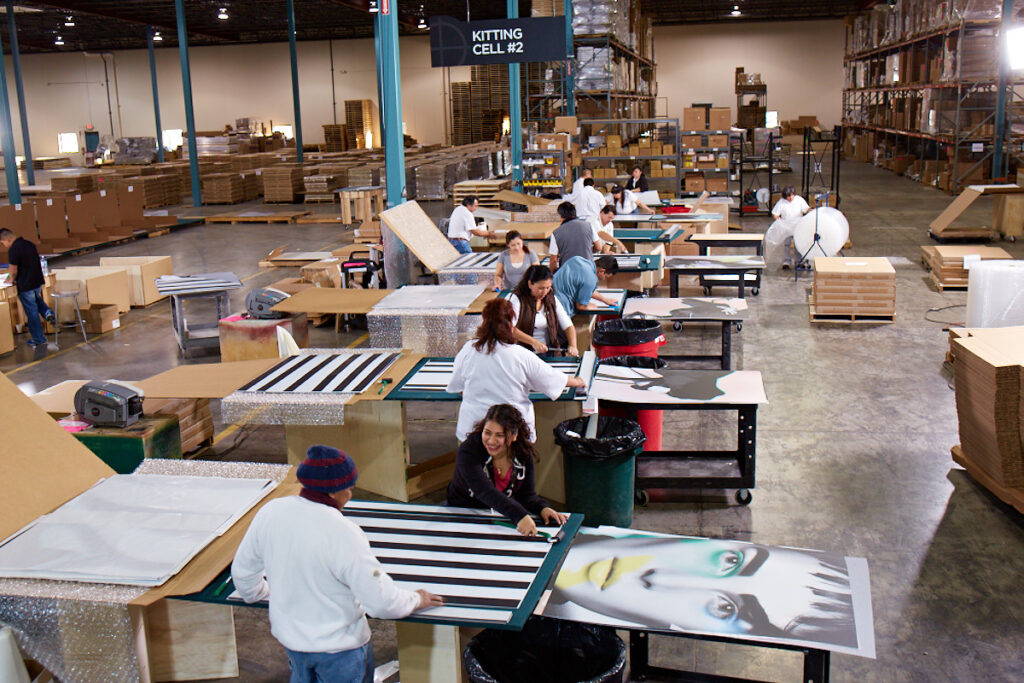 An aerial view of employees working through production.