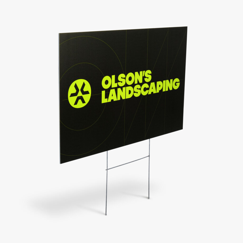 A yard sign for Olson's Landscaping.