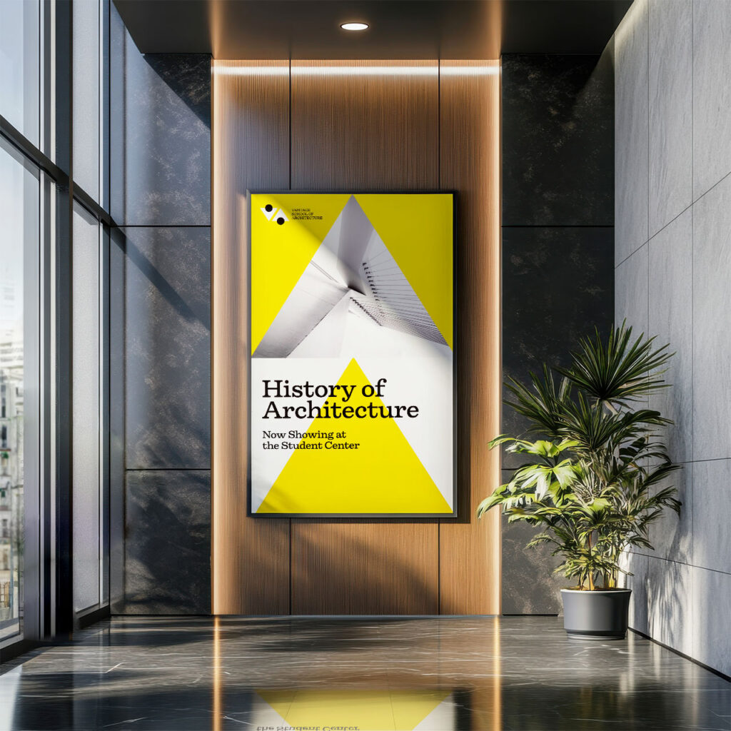 A silicone edge graphic hanging in a lobby and printed with History of Architecture in white and yellow.