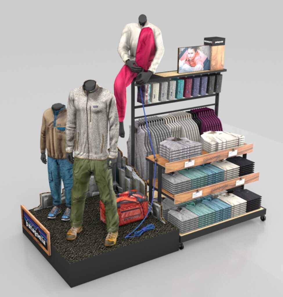 Modular Patagonia retail display featuring styled mannequins in outdoor gear alongside organized apparel shelves and a climbing rope accent.