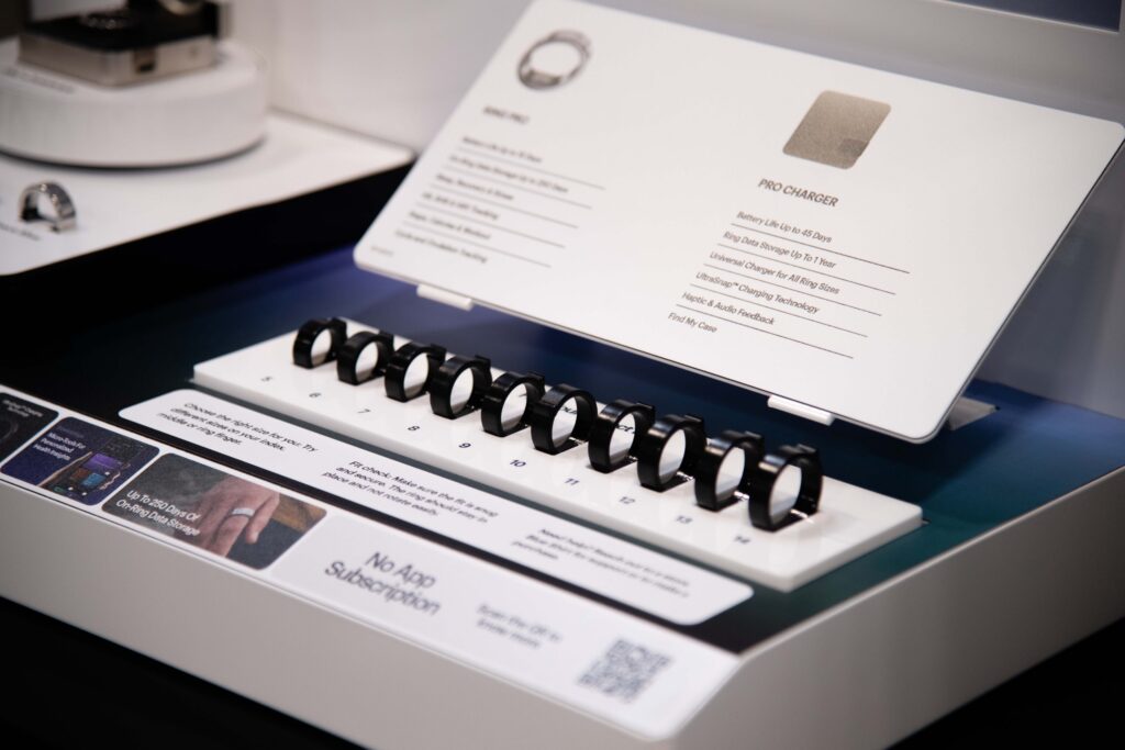 Detailed view of the Ultrahuman ring sizing kit section built directly into the retail counter display.